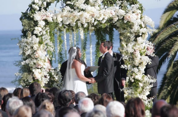 Wedding altar wrapped in flowers